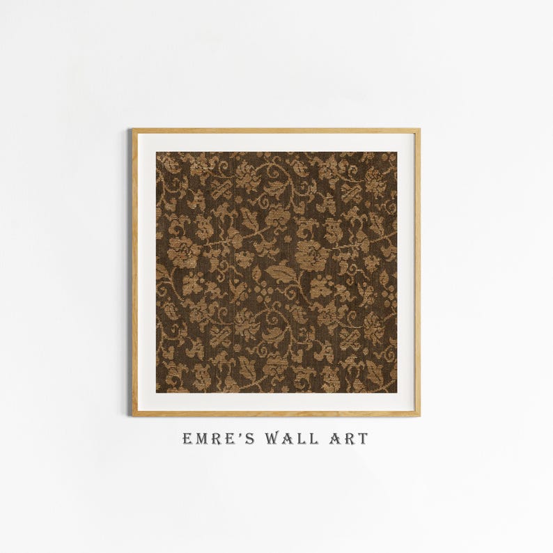 An antique-style botanical fabric art print featuring an intricate rustic textile pattern in warm brown tones. The design shows woven floral vines and leaves, arranged in an old-world tapestry style. The soft contrast between background and pattern gives a sense of depth and age. Ideal for vintage-inspired digital wall decor and home styling.