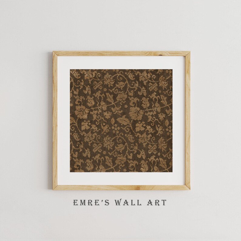An antique-style botanical fabric art print featuring an intricate rustic textile pattern in warm brown tones. The design shows woven floral vines and leaves, arranged in an old-world tapestry style. The soft contrast between background and pattern gives a sense of depth and age. Ideal for vintage-inspired digital wall decor and home styling.