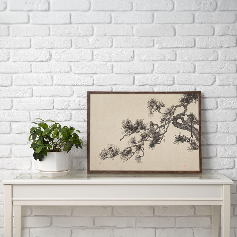 A vintage Japanese ink wash painting of a pine tree branch with detailed pine needles and a small pinecone against a textured beige paper background. The elegant black brushstrokes capture a minimalist, traditional East Asian artistic look. A small red artist seal is visible in the bottom right corner.
