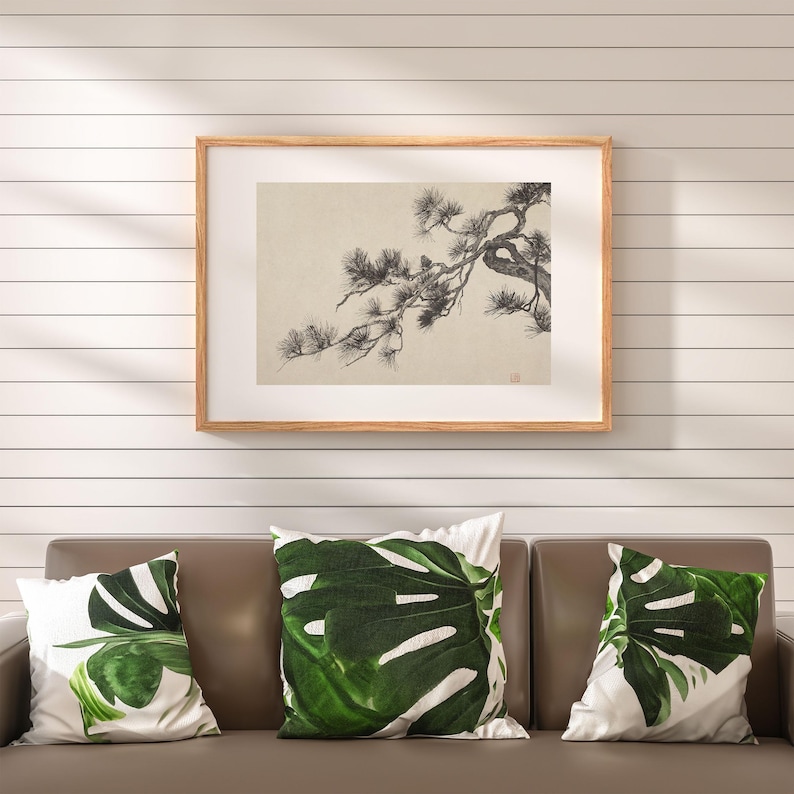 A vintage Japanese ink wash painting of a pine tree branch with detailed pine needles and a small pinecone against a textured beige paper background. The elegant black brushstrokes capture a minimalist, traditional East Asian artistic look. A small red artist seal is visible in the bottom right corner.