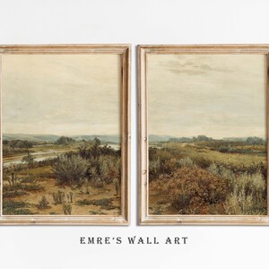 May include: A pair of framed landscape paintings with a muted color palette depicting a river winding through a field of tall grasses and trees. The paintings are in a light wood frame.