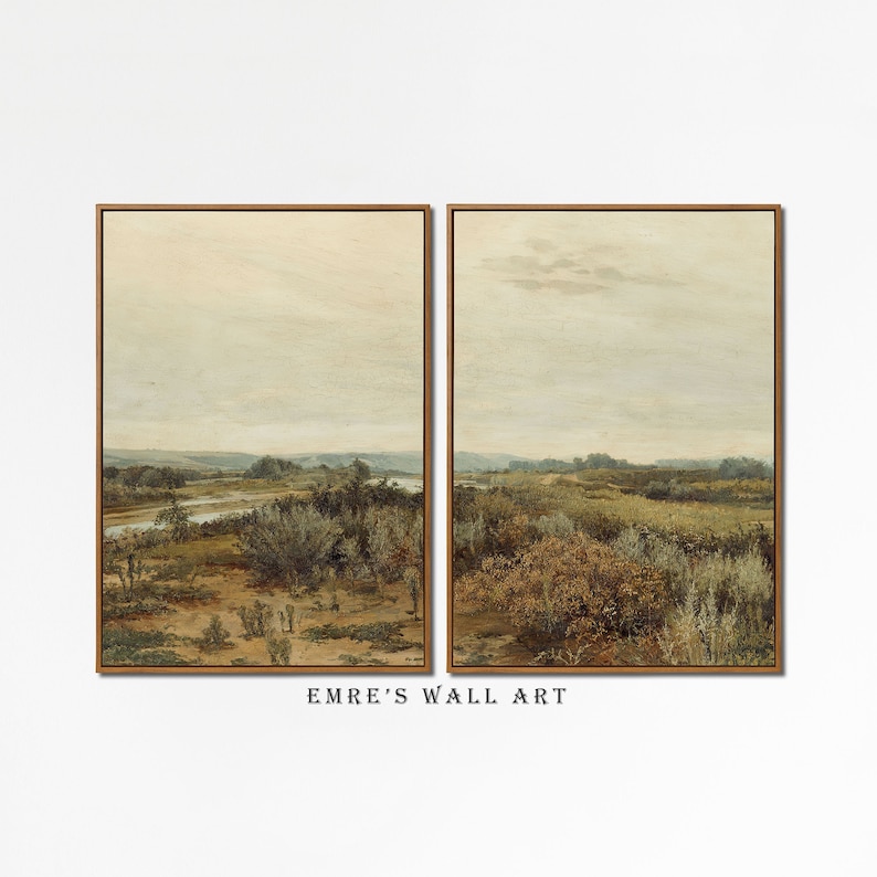 May include: A set of two framed landscape paintings depicting a rural scene with a river, trees, and a cloudy sky. The paintings are in a muted color palette of greens, browns, and blues.