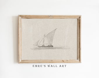 Könnte beinhalten: Eine gerahmte Schwarzweißzeichnung eines Segelboots mit einem einzigen Segel auf dem Wasser. Die Zeichnung ist auf einem beigefarbenen Hintergrund und der Rahmen ist aus hellem Holz. Der Text "EMRE'S WALL ART" ist unter dem Rahmen gedruckt.