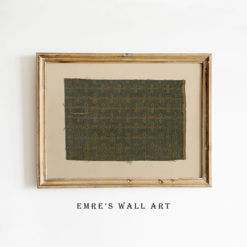 Vintage green textile pattern print showing a woven fabric fragment in muted teal green with small gold motifs arranged in a grid, subtle tapestry texture and slight frayed edges, photographed on a neutral background; ideal for textile motif print, fabric pattern poster, and antique fabric wall art digital download.