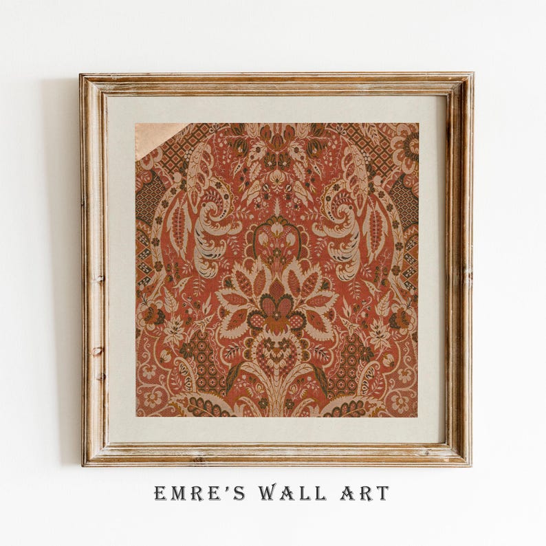 May include: Framed wall art featuring a detailed, ornate pattern in shades of red, brown, and cream. The design includes floral and paisley-like motifs. The artwork is set within a gold-toned wooden frame, with the text "EMRE'S WALL ART" at the bottom.