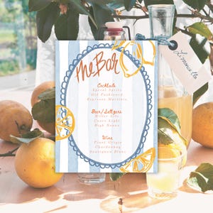 May include: A blue and white striped card with a handwritten menu titled "The Bar" featuring cocktails, beer and seltzers, and wine options. The card is decorated with lemons and a blue and white border.