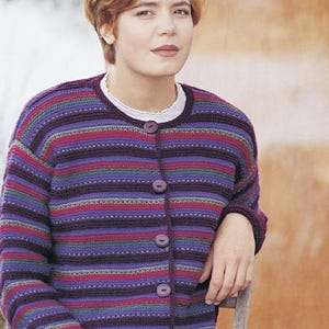 May include: A striped cardigan with a button-up front. The cardigan is made of a soft, knitted fabric and features a variety of colors, including purple, red, green, and gray.
