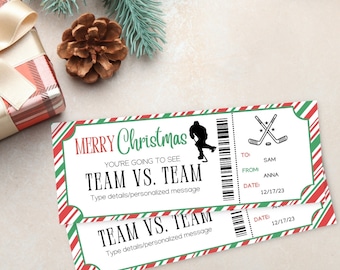 May include: Two red, white, and green striped Christmas ticket stubs with the text "Merry Christmas" and "You're going to see Team vs. Team" with a hockey stick and puck graphic. The tickets have a date of 12/17/23 and the names Sam and Anna.