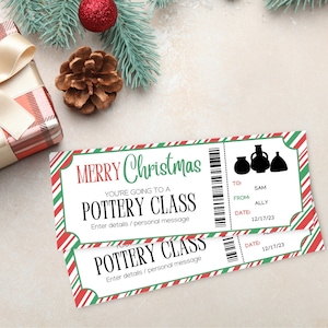 May include: Two red, white, and green striped gift certificates for a pottery class. The text on the certificates reads "Merry Christmas, You're going to a Pottery Class, Enter details/personal message". The certificates have a barcode and a space for the recipient's name, the giver's name, and the date.