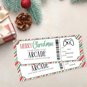 May include: A printable Christmas gift certificate for an arcade. The certificate is red and green with a candy cane stripe pattern. It says "Merry Christmas, You're going to an Arcade" and has space to enter details and a personal message.