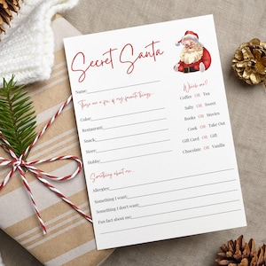 May include: A Secret Santa questionnaire on white paper with red script. The form includes prompts for name, favorite things, and a section titled "Something about me." A watercolor illustration of Santa Claus is in the upper right corner. The form is next to a wrapped gift.