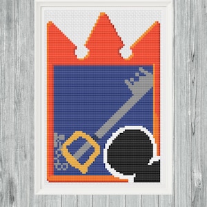 May include: A blue and orange pixel art design of a key with a crown on top. The key has a yellow chain and a black circle at the end.