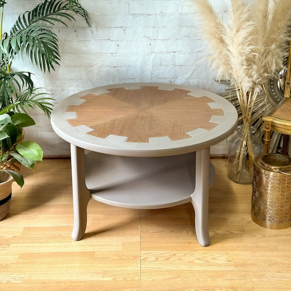 Round beige online coffee table
