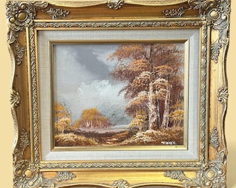 Pintura al óleo vintage firmada por T. O'Neil, paisaje en marco dorado ornamentado.