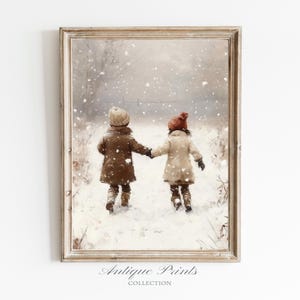 May include: A framed print showing two children in winter coats and hats, walking hand-in-hand through a snowy landscape. The print has a vintage style, with the text "Antique Prints Collection" at the bottom.