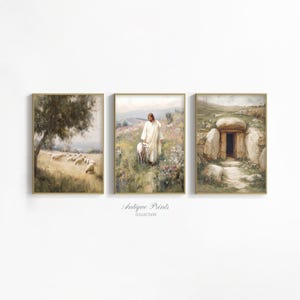May include: A triptych of framed art prints with pastoral themes. One shows a tree and sheep, another a figure with a lamb, and the third a stone structure. The frames are finished in gold. The text "Antique Prints Collection" is visible.