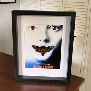 Silence of the Lambs movie poster with real Death's Head Hawk-moth, Acherontia atropos, in a black shadowbox