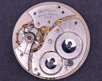 Vintage Waltham Pocket Watch Movement. Complete, Not Running. Year 1929. Size 12. Grade 210. 7 Jewels. Metal Face. No Minute Hand.