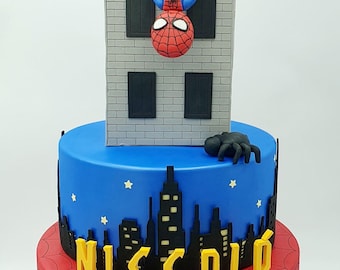 3-tier fake Spiderman/Spiderman birthday cake in eva rubber. Spiderman handmade in cold porcelain.