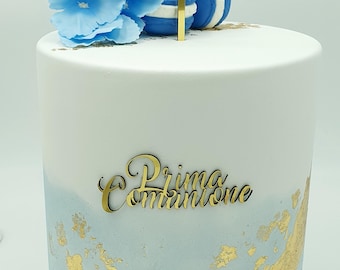 Fake shaded scenic cake with gold details, flowers and fake macarons, customizable for Communion or other events.