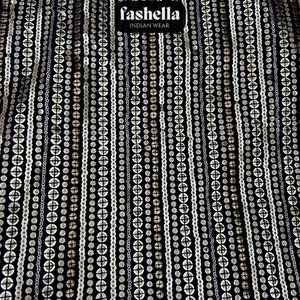 May include: Black fabric with a repeating pattern of white and gold sequins. The fabric has a label that reads "fashella INDIAN WEAR".