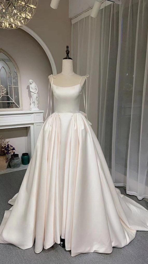 wedding dress pink ribbon Blush Pink Satin Corset Wedding Ballgown With Detachable Bow | Lilibet