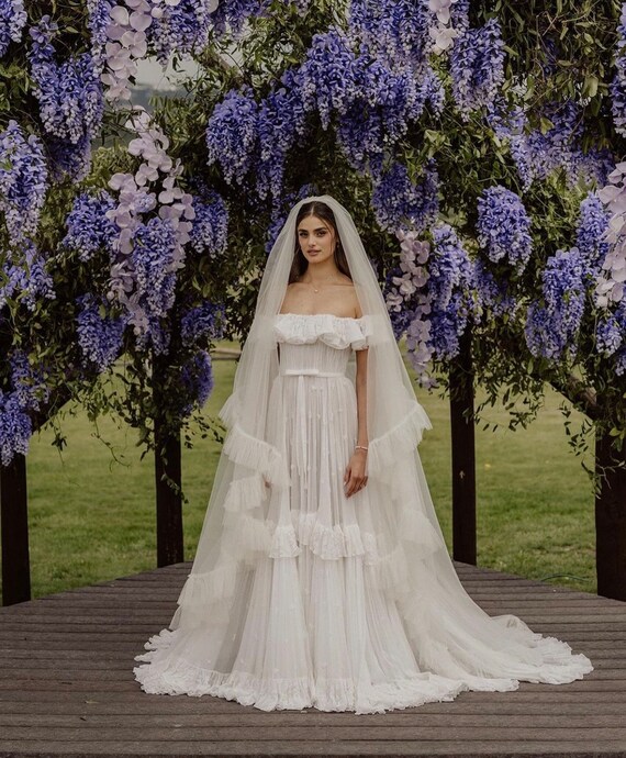 Taylor Hill wore the first wedding dress made by Etro for her wedding to  Daniel Fryer