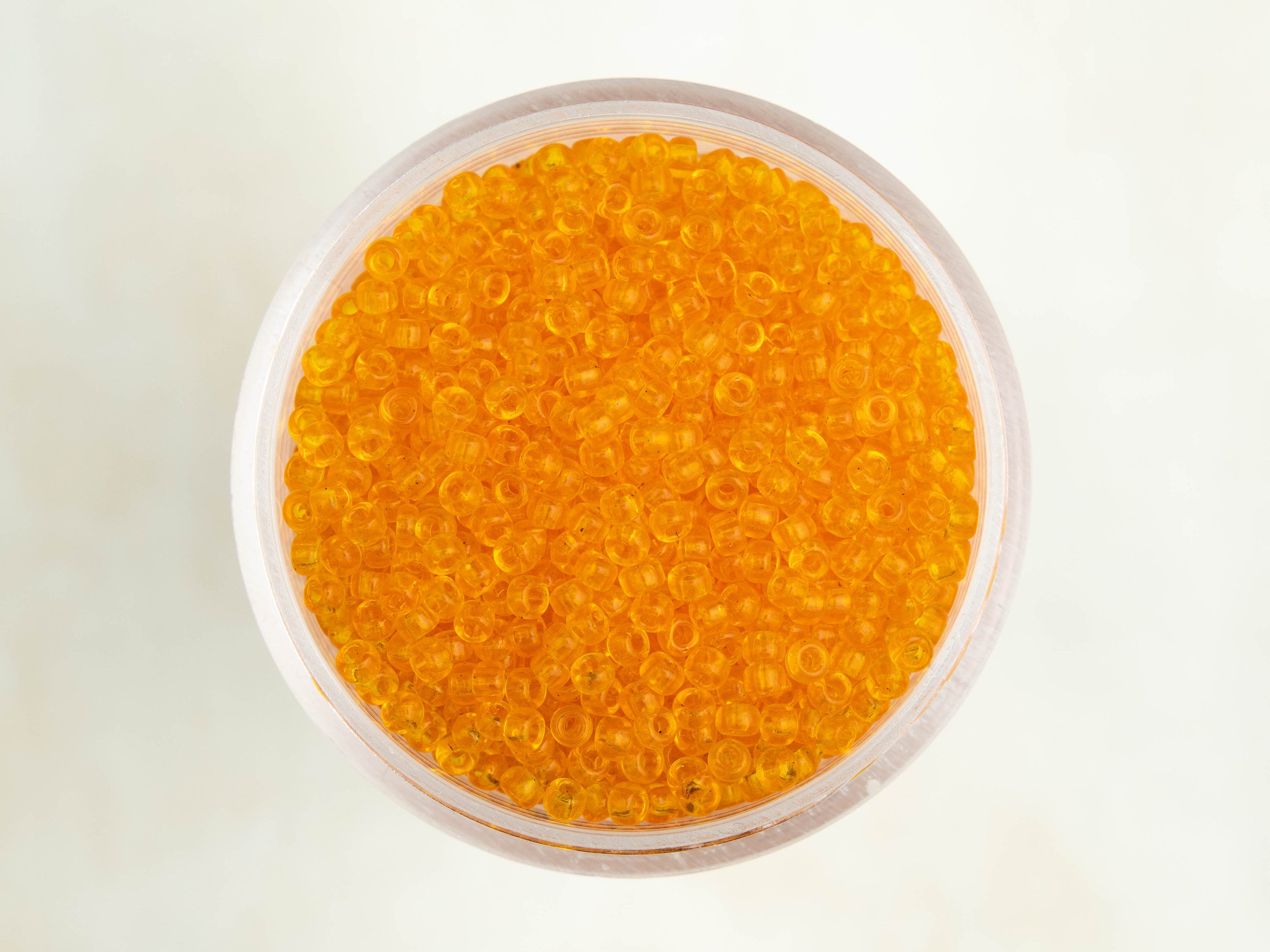 Miyuki 11/0 Round Seed Beads - Transparent Light Orange - 11-137