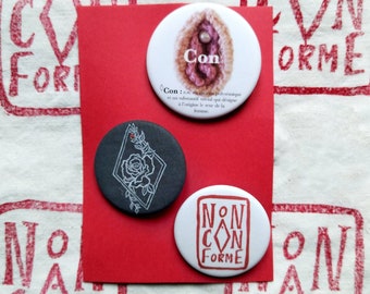 Trío de insignias NonConForme