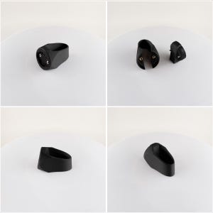 May include: Four views of black plastic bicycle accessories. The accessories include a circular mount with two screw holes, a curved bracket with two screw holes, and two other small, angled pieces. The items are displayed on a white surface.