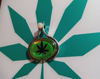 Green Pot leaf with opal gemstone on the top