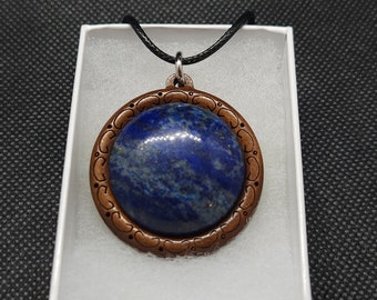 Lapis lazuli gemstone wooden backing pendant.