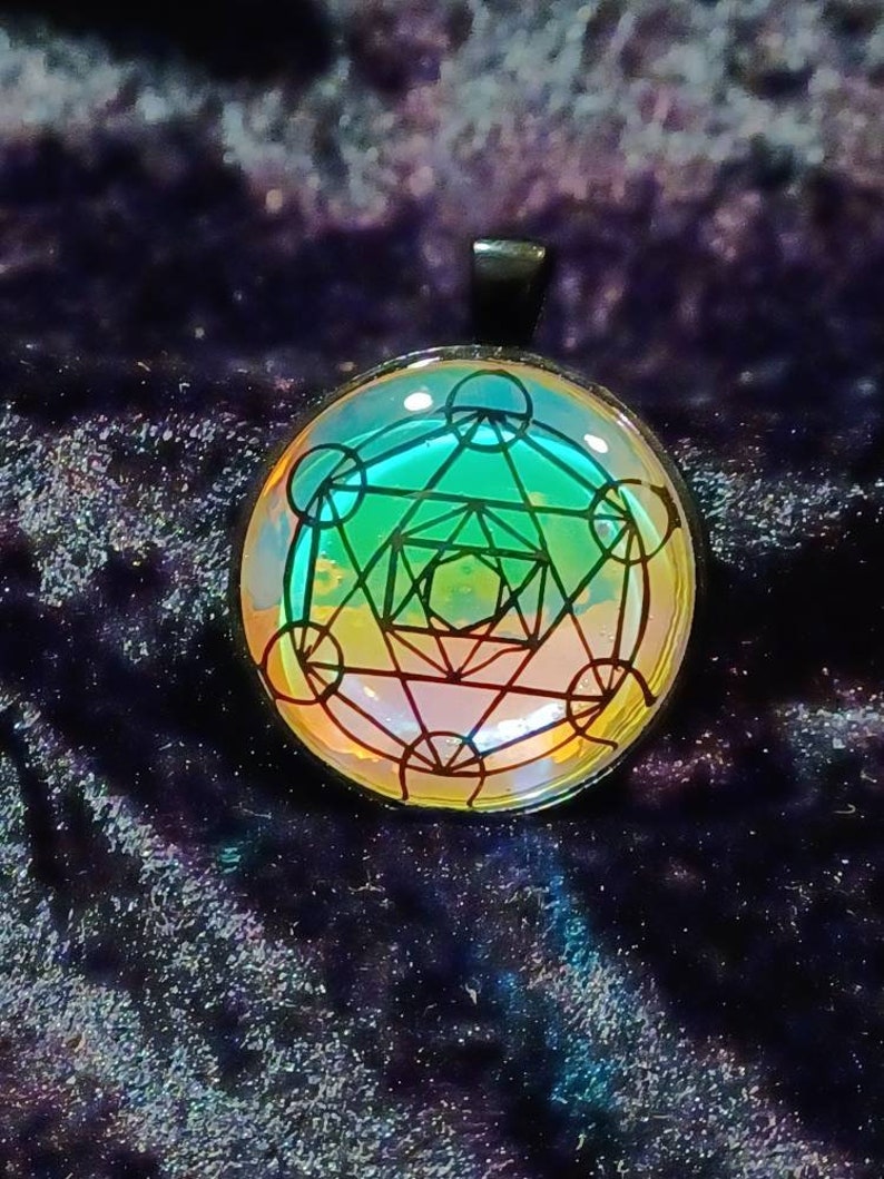 Meratrons cube/merkaba sacred geometry double sided glass pendant. image 1