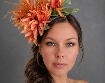 Orange flower, feather fascinator. Wedding guest pillbox headband. Tea party hat.