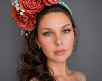 Light turquoise blue orange rose fascinator. Wedding guest headband with flower, tea party hat.