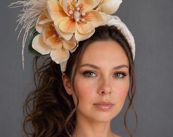 Cream magnolia, pearl and feather fascinator. Wedding guest headband with flower, tea party hat.