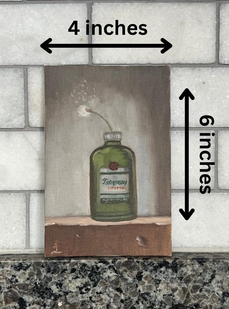 May include: Oil painting of a green gin bottle with a white label and a single white flower. The artwork is 4 inches wide and 6 inches tall. The bottle is labeled "Tanqueray" and is set against a neutral background.