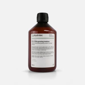 May include: A brown bottle with a black cap, labeled "phydrotec" and "F/2 x1000 growing medium." The label includes instructions and lists ingredients. The bottle contains 500 ml of liquid.