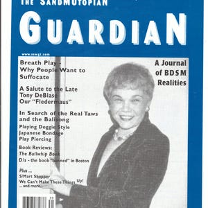 May include: A magazine cover with the title "GUARDIAN" in large white letters. The cover features a smiling woman and text including "A Journal of BDSM Realities" and "Issue #39 Special Souvenir Issue."