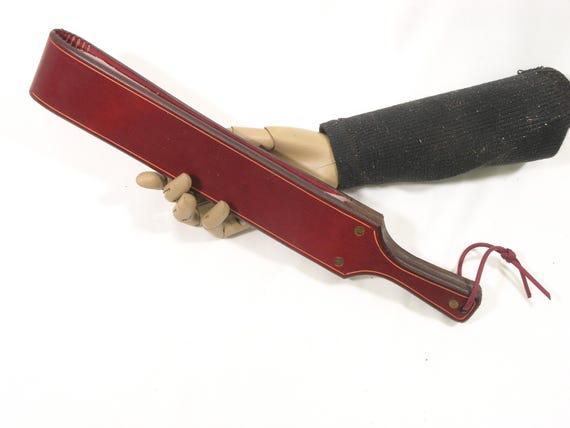 The Small Straddle a cross between a Leather Strap and a leather Paddle