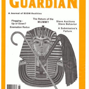 May include: The cover of "Guardian" magazine, issue #26, features an illustration of a pharaoh with a staff and a whip. The magazine's title is in large orange letters. The cover also includes text about BDSM themes.
