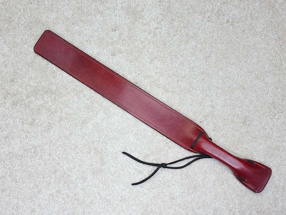 The Big Brother:  a serious BDSM leather punishment instrument
