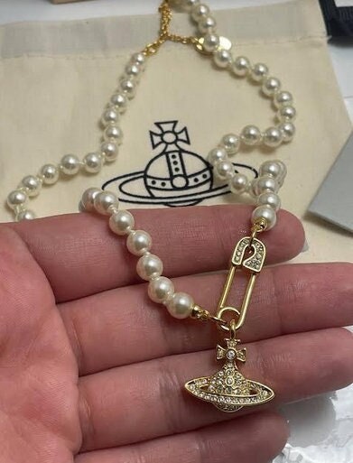 Vivienne Westwood Gold Lucrece Pearl Pin Necklace - Etsy Vivienne Westwood Gold Lucrece Pearl Pin Necklace - Etsy