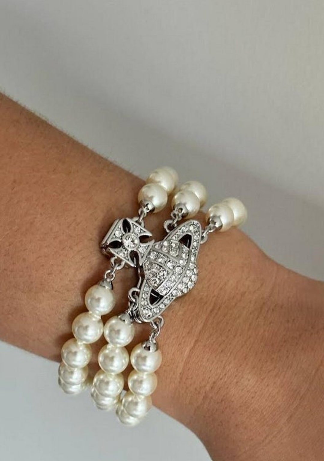 Vivienne Westwood Silver GRAZIELLA Three Row Pearl Bracelet Vivienne Westwood Silver GRAZIELLA Three Row Pearl Bracelet