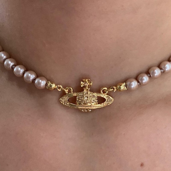 New in Box Vivienne Westwood Gold 