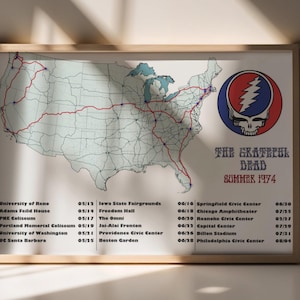 May include: Framed print featuring a map of the United States with a red route overlay, and a Grateful Dead logo. The text "THE GRATEFUL DEAD SUMMER 1974" is displayed, along with a list of tour dates and venues.