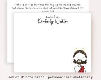 May include: A set of white personalized note cards featuring the text 'a note from Kimberly Westin' in black script, a cartoon illustration of a bearded figure with a yellow halo, and the Bible verse John 3:16 printed in black text.