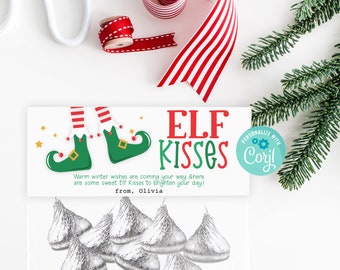 May include: A printable gift tag with an illustration of elf feet and the text "ELF KISSES". The tag is decorated with stars and red and green stripes. The text "Warm winter wishes are coming your way & here are some sweet Elf Kisses to brighten your day! from, Olivia" is printed on the tag.