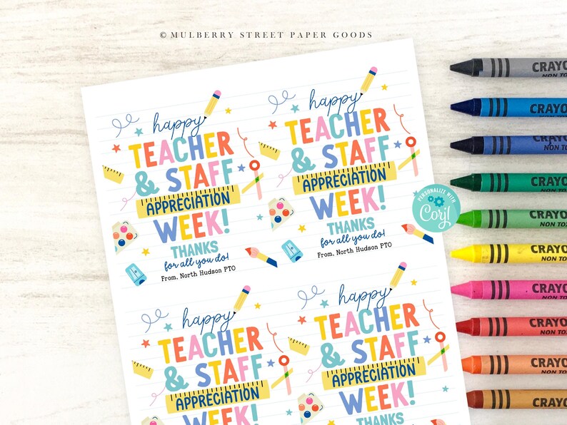 May include: A sheet of paper with the words "Happy Teacher & Staff Appreciation Week!" in colorful text. The design includes pencils, rulers, and stars. Crayons in various colors are arranged along the right side.