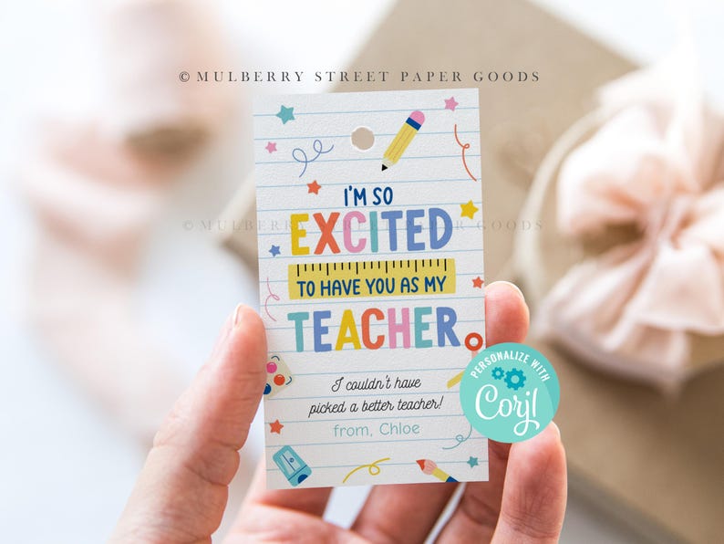 May include: A colorful teacher appreciation gift tag with the text "I'm so excited to have you as my teacher."  The tag has a ruler, pencil, and other school-themed illustrations.  The tag also includes a personalized circle sticker with the text "Personalize with Cory!"